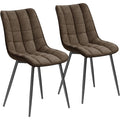 Deux chaises de salle a manger en similicuir brun clair, siege confortable pour interieur contemporain